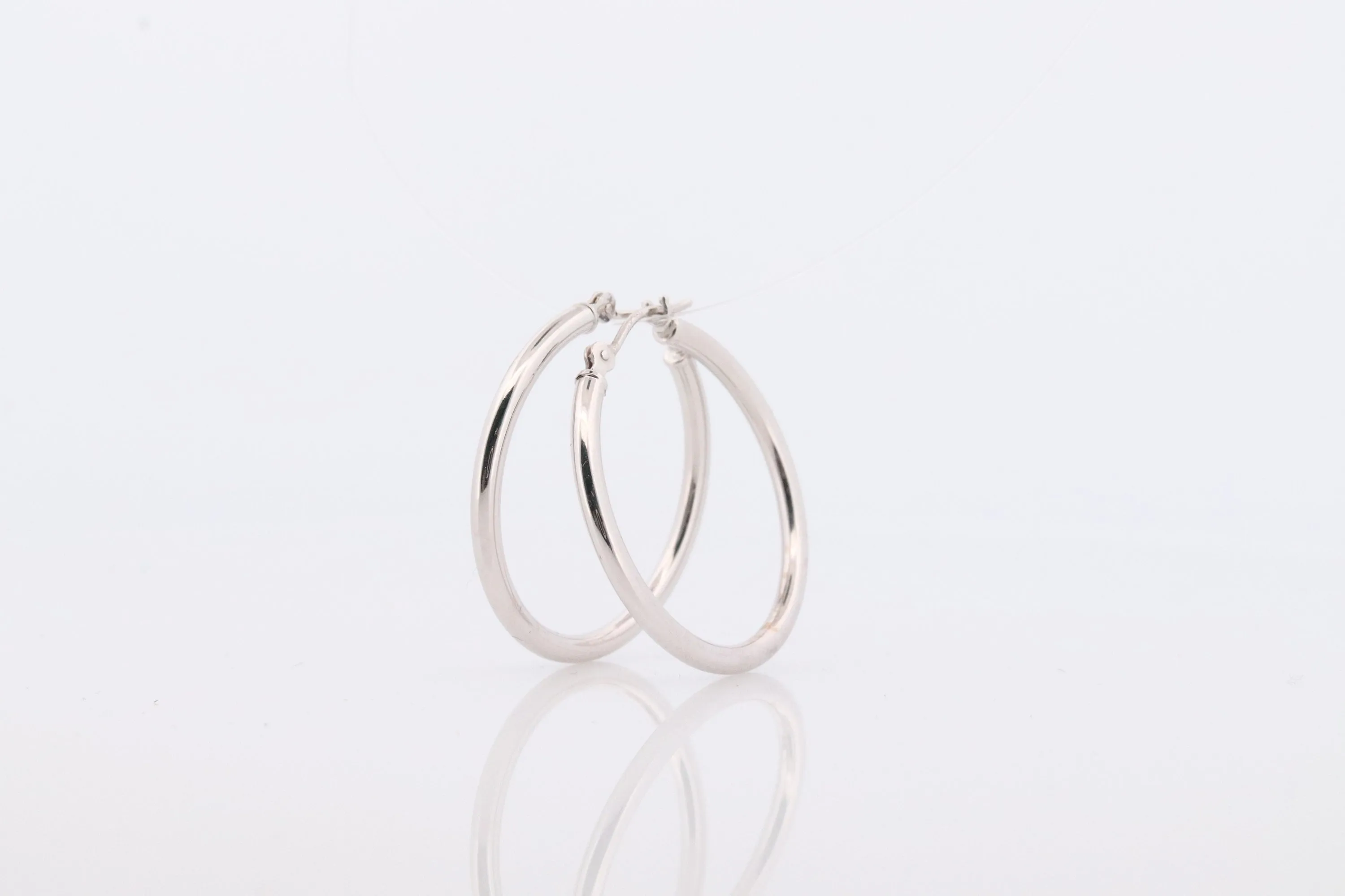 14k White Gold HOOP Earrings. HOOP Puffed Dangle earrings by JCM Jacmel. Wide Hoops.
