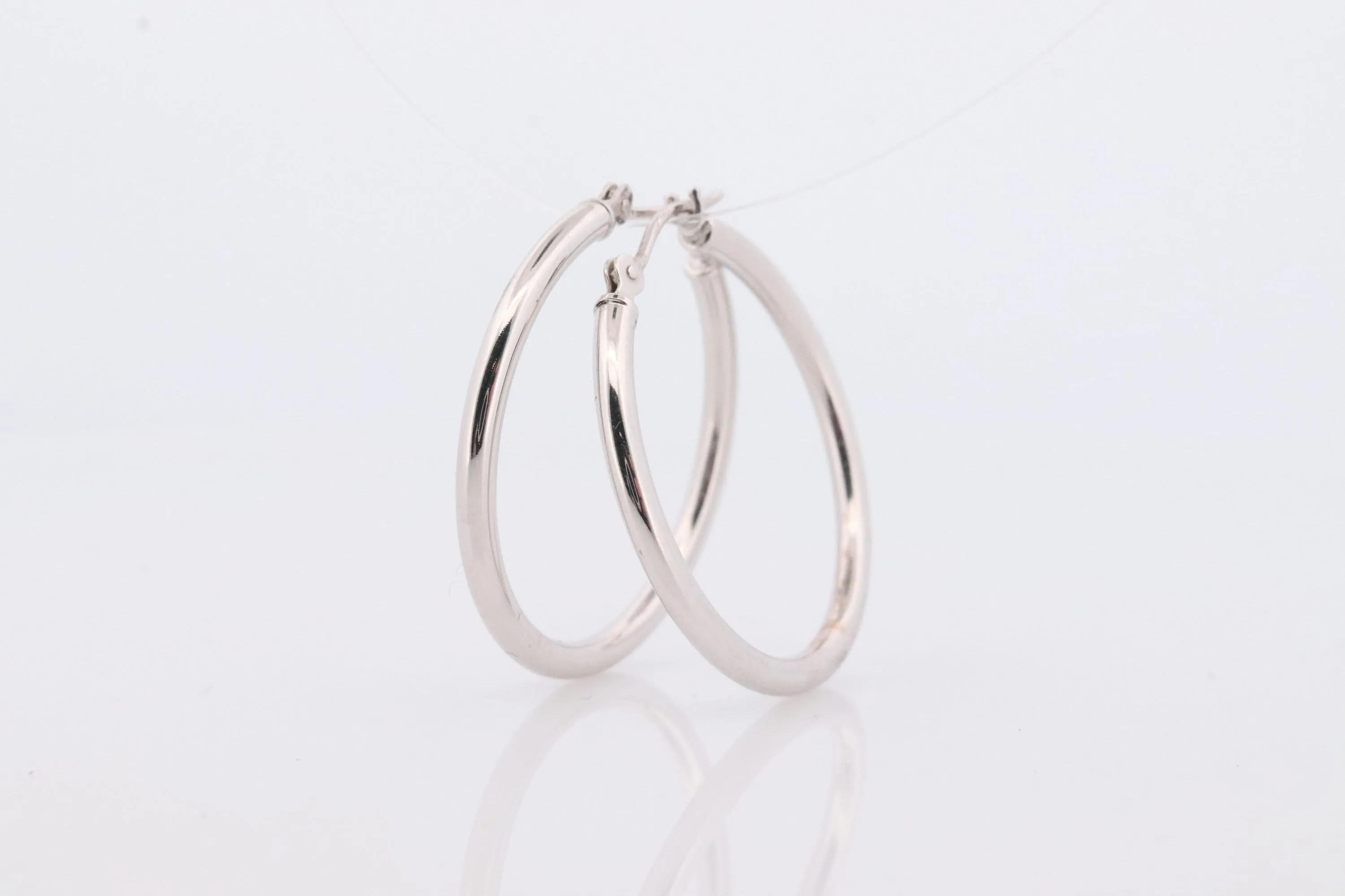 14k White Gold HOOP Earrings. HOOP Puffed Dangle earrings by JCM Jacmel. Wide Hoops.
