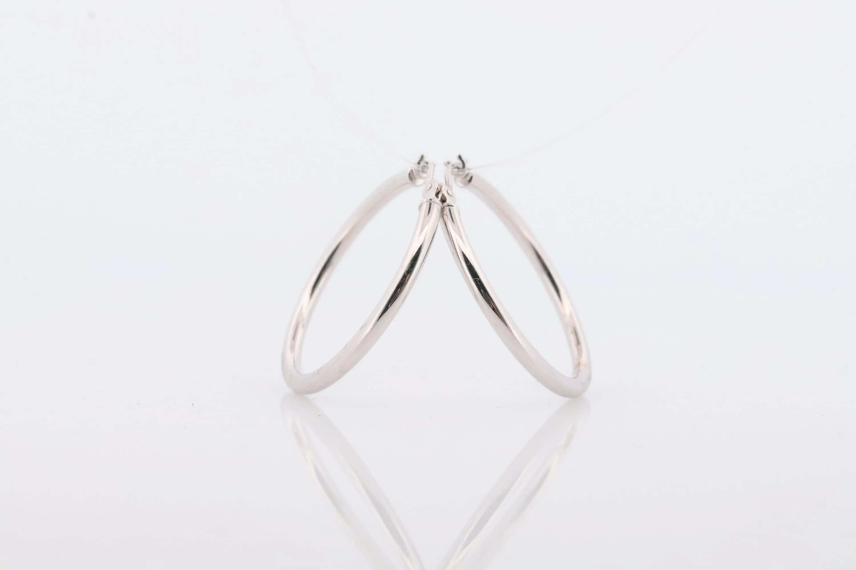 14k White Gold HOOP Earrings. HOOP Puffed Dangle earrings by JCM Jacmel. Wide Hoops.