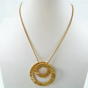 Contemporary flat swirl on snake chain