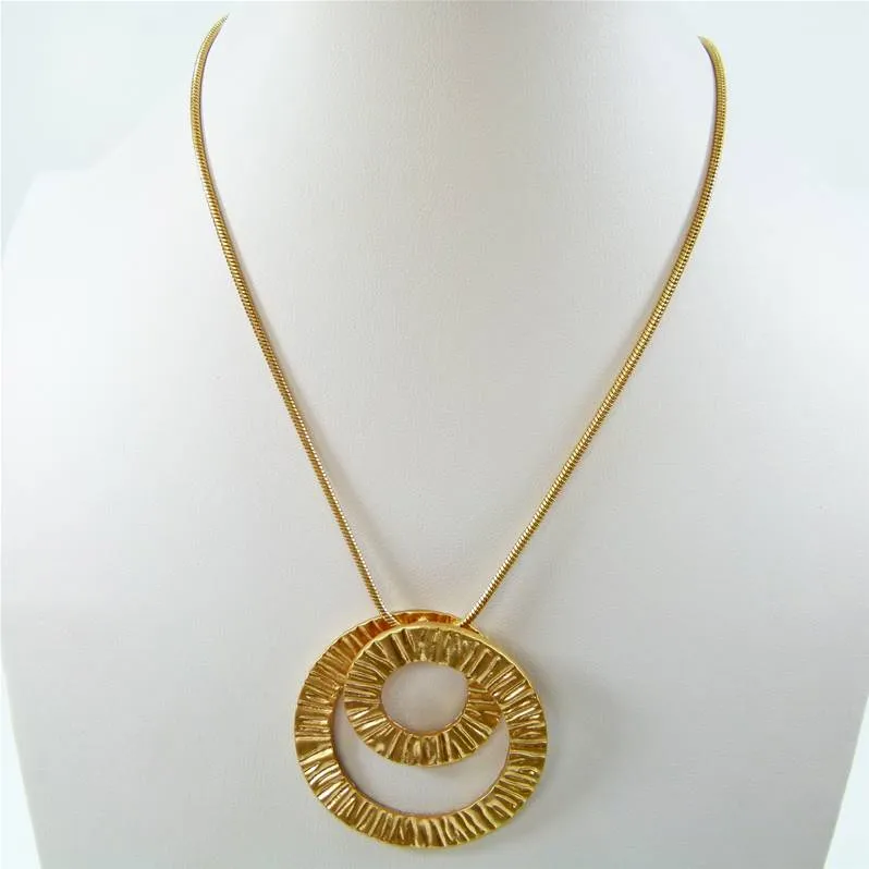 Contemporary flat swirl on snake chain
