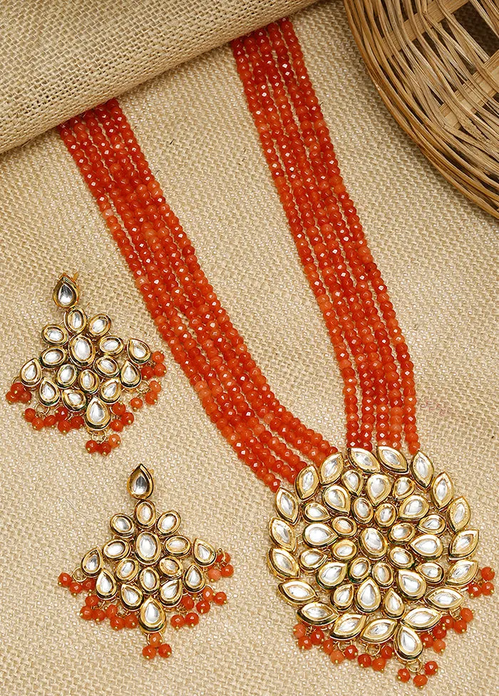 Gold Plated Kundan Jewellery Set With Orange Beads