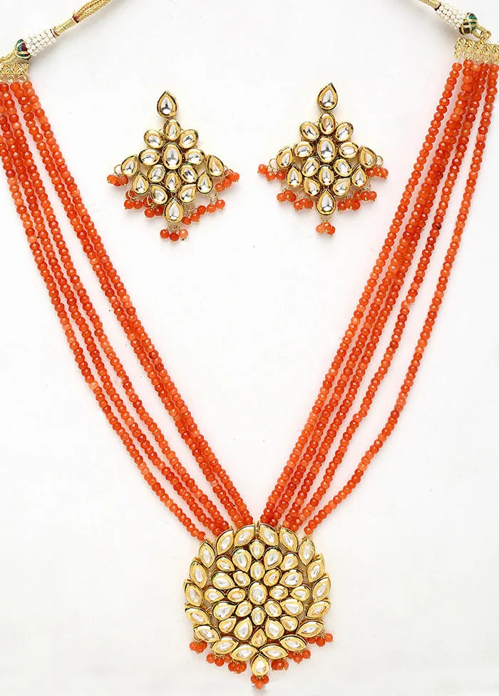Gold Plated Kundan Jewellery Set With Orange Beads
