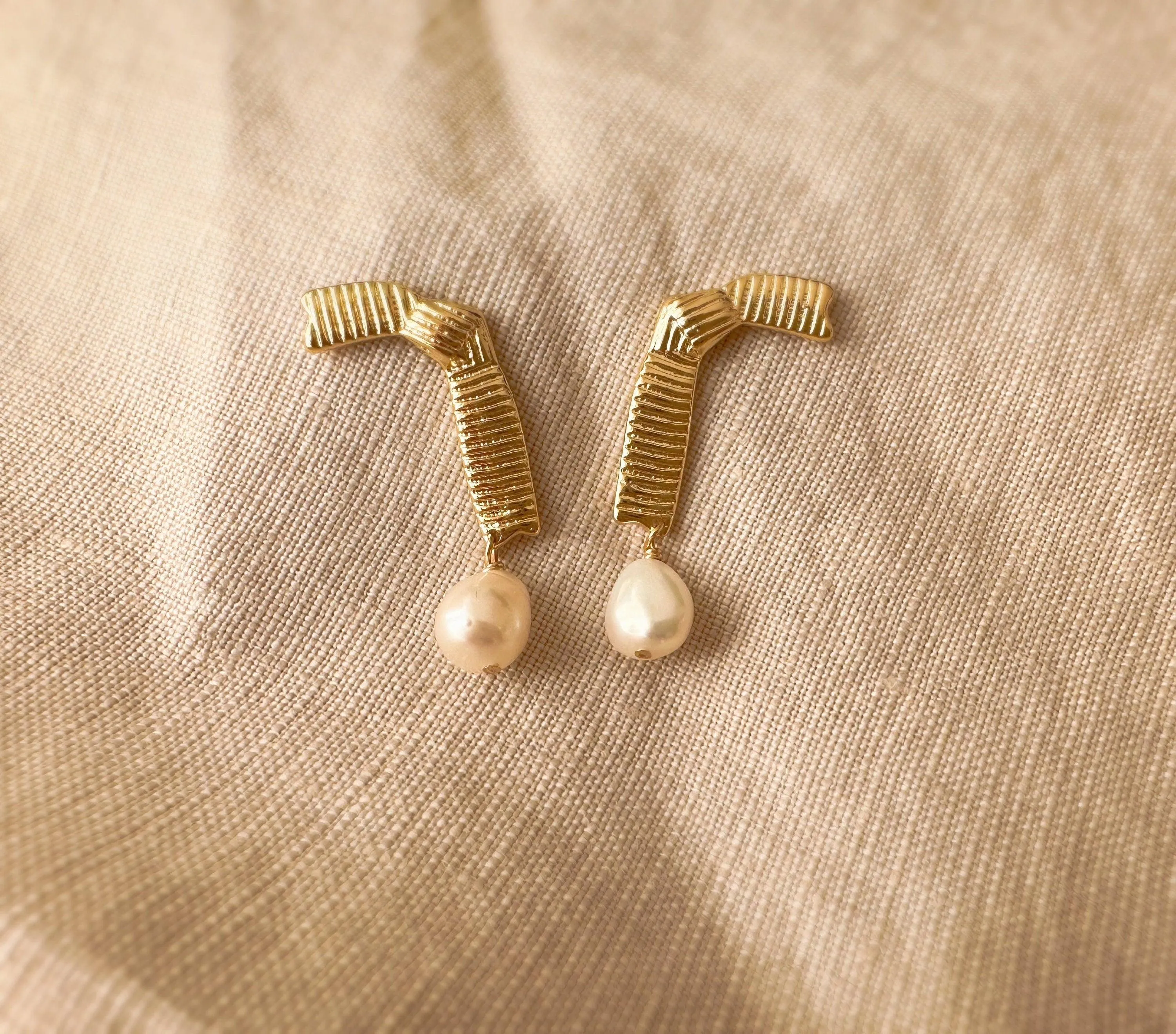 Stylish 14K gold plated asymmetrical earrings with pearl pendants