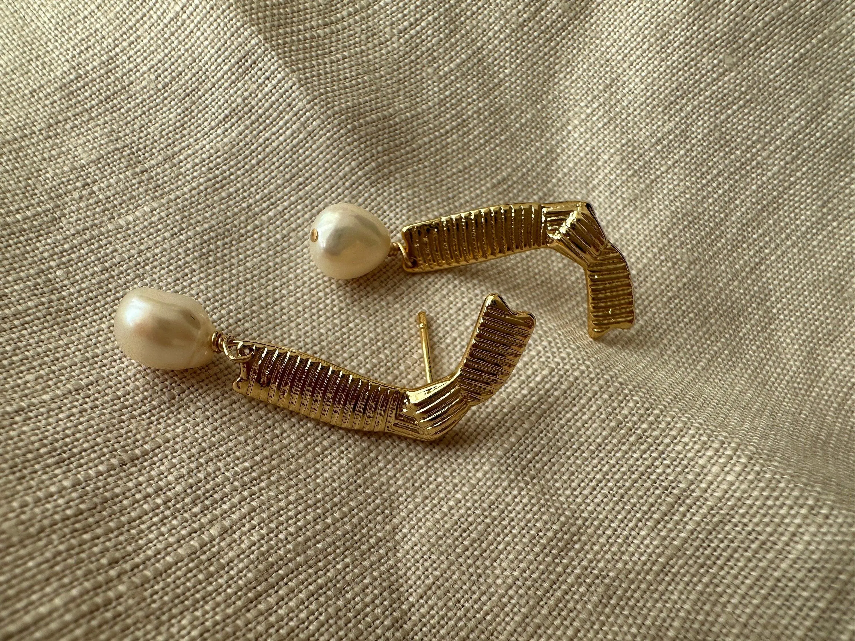 Stylish 14K gold plated asymmetrical earrings with pearl pendants